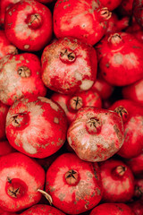  tasty ripe red pomegranate on the food market