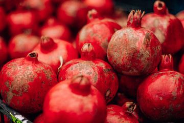  tasty ripe red pomegranate on the food market