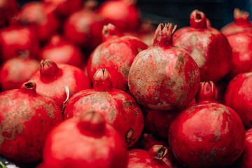  tasty ripe red pomegranate on the food market