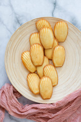 Plate of Madeleines on Marble Background