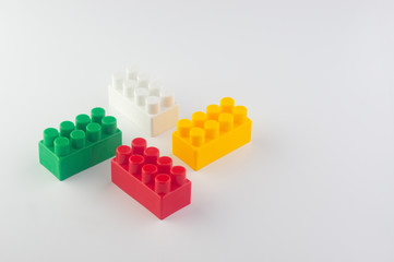 oblong bricks of the children's designer of red, green, yellow and white