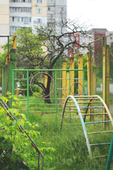 Fototapeta premium Playground overgrown with plants