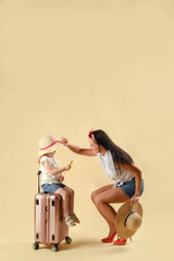 Happy running family with suitcases isolated on white, travel concept