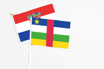 Central African Republic and Croatia stick flags on white background. High quality fabric, miniature national flag. Peaceful global concept.White floor for copy space.