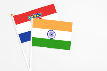 India and Croatia stick flags on white background. High quality fabric, miniature national flag. Peaceful global concept.White floor for copy space.