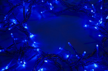 Abstract pattern of blue neon illuminations holidays background greeting card free space for your text