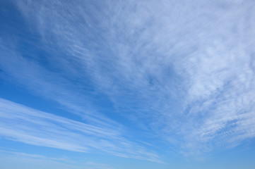 Blue sky background with cirrus clouds