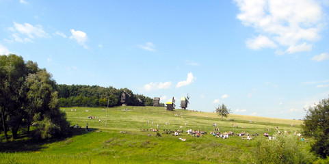 Fototapeta na wymiar windmills in a historic park in ukraine