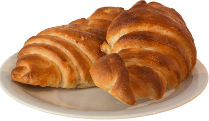 croissant  fatti in casa sopra un piatto con sfondo bianco