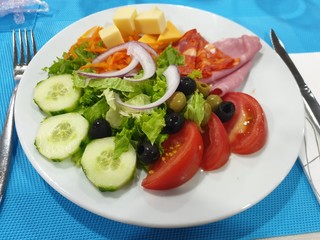 fresh salad with tomatoes and cucumbers