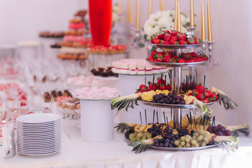 Sweet desert on the table. Different desserts on candy bar