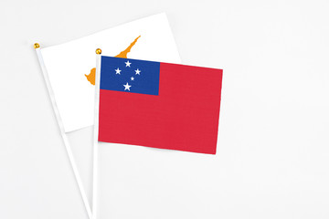 Samoa and Cyprus stick flags on white background. High quality fabric, miniature national flag....