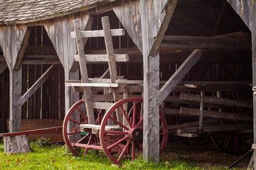 old wagon wheel of barn