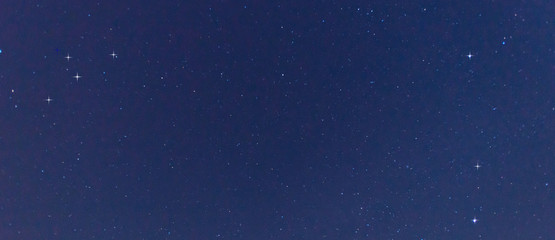 Panorama blue night sky milky way and star on dark background.Universe filled with stars, nebula and galaxy with noise and grain.Photo by long exposure and select white balance.selection focus.amazing