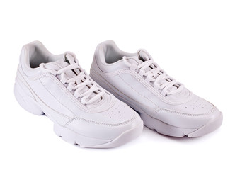 White sneakers isolated on a white background.