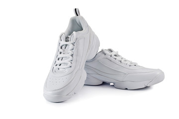 White sneakers isolated on a white background.