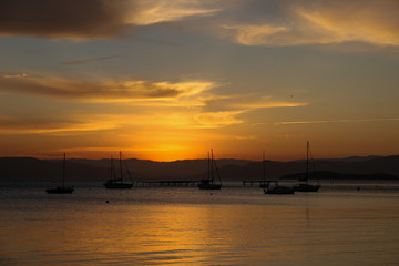 Naklejka premium beach with golden sunset