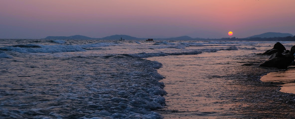 Amazing of Thailand sea beaches.Dazzling light Of the setting sun.Beach leisure tourism concept.Relaxing place to stay after the covid-19 outbreak. © Mohwet