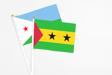 Sao Tome And Principe and Djibouti stick flags on white background. High quality fabric, miniature...
