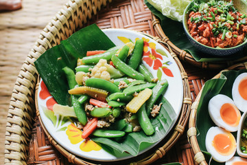 Stir-fried vegetable combination with pork , Fried pork with vegetables stir fried broccoli and carrot with slice pork in oyster sauce on plate