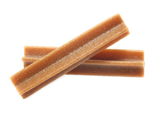 bones and colorful sticks for dog treat with vitamin and oral health on white background