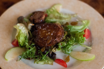 Pan fried  foie gras goose liver on a bed of liver
