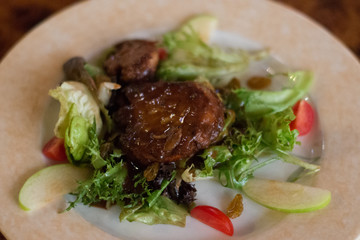 Pan fried  foie gras goose liver on a bed of liver