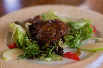 Pan fried  foie gras goose liver on a bed of liver