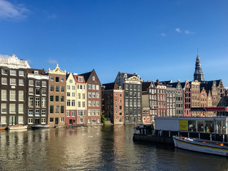 Obraz premium Iconic homes along the canals of Amsterdam in the Netherlands
