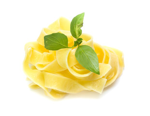 Naklejka na ściany i meble Fettuccine italian pasta isolated on white background