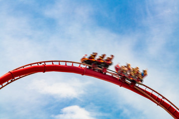 Motion blur of people in a rollercoaster