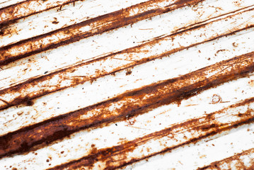 Rusted Diagonal Lines on White Paint