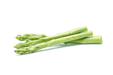 Fresh green asparagus on white