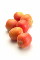 fresh tomatoes isolated on white background