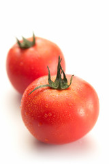 fresh tomatoes isolated on white background