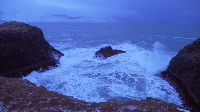 Iceland Rough Ocean Water Crashes Against Large Cliffs In Arnarstapi 5