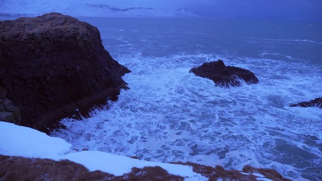Iceland Rough Ocean Water Crashes Against Large Cliffs In Arnarstapi 6