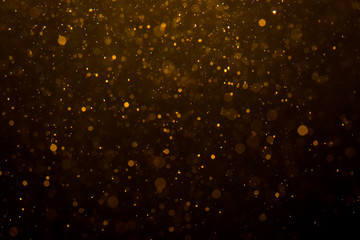 Abstract gold bokeh with black