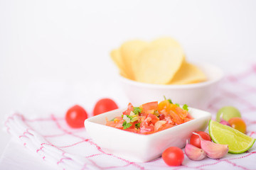 Delicious salsa mexican appetizer food on a white background prepared for a holiday party