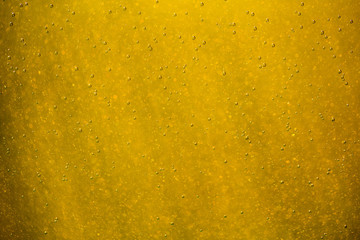 abstract gold and white bokeh and bubbles in the water