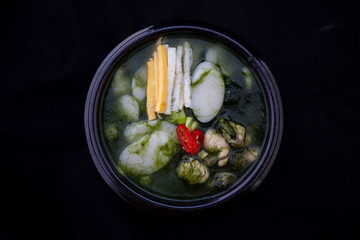 Korean Rice cake Seaweed Fulvescens Soup with oyster which is called Maesaeng-i Tteoggug