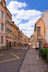 Street view with old houses at Citadel of Besancon at Bourgogne Franche-Comte region, France. Town building architecture at French Castle and medieval stone fortress in Burgundy. - obrazy, fototapety, plakaty