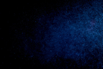 Blue bokeh on black  use fir background