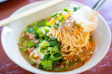 instant noodle soup with pork and egg