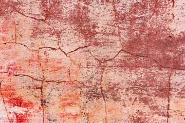 Texture of a concrete wall with cracks and scratches which can be used as a background