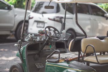 Blurred background of small cars, cars used to send customers in housing estates, for the convenience of service for customers to look at homes