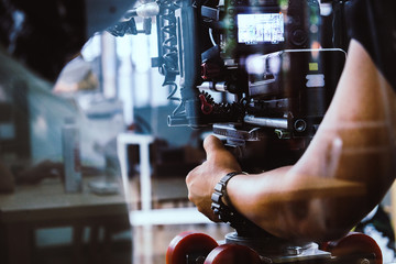 Film industry. Filming with professional camera background