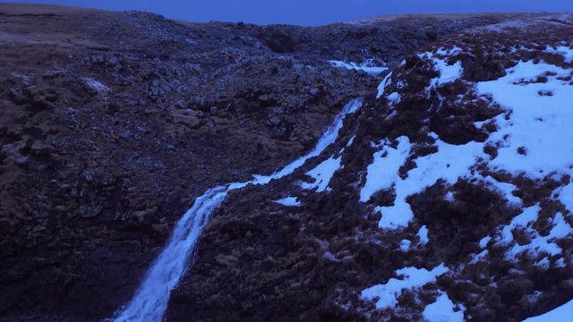 Iceland View Of Waterfall And Large Cave Blow Hole Erupting Ocean Water High In Arnarstapi 1