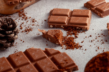 Chocolate bar on cement background