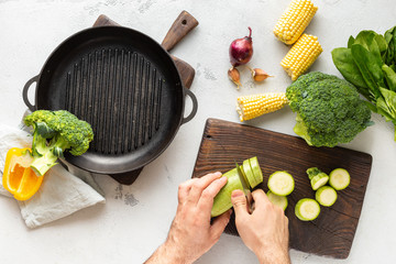 Fresh vegetarian various ingredients for cooking vegan grilled food overhead view